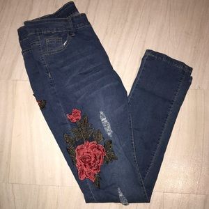 Rose appliqué skinny jeans
